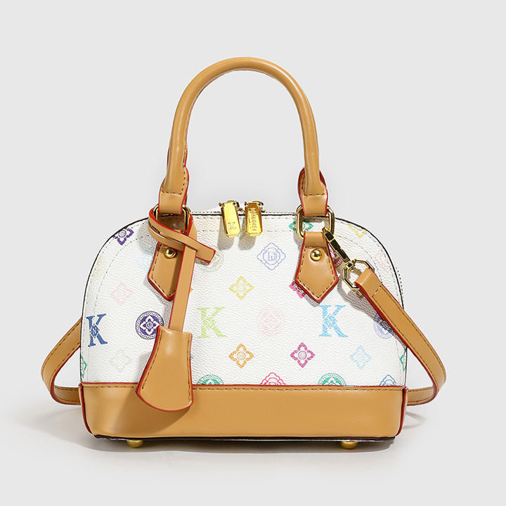 2025 Model Shell Bag. Made of Fashionable PU Material, It Is Decorated with Rivets and Can Be Carried by Hand.6036